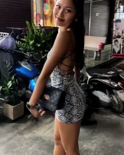 Teen asian bargirl posing for client'